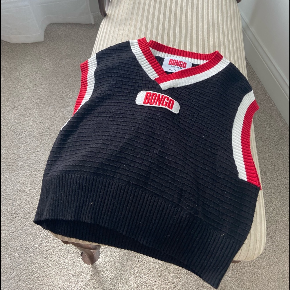 This is a trendy sweater vest that works for all seasons